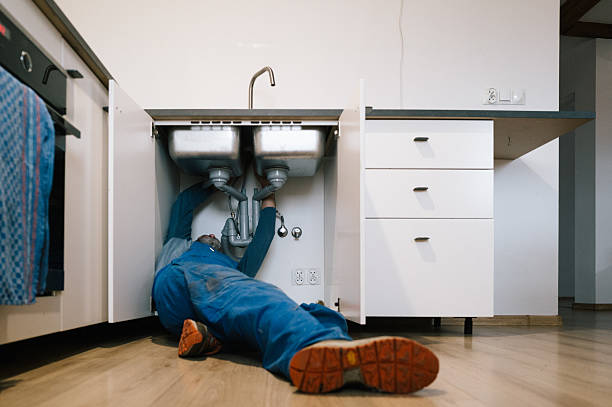 Professional Plumbing technician working in Wellsville, UT